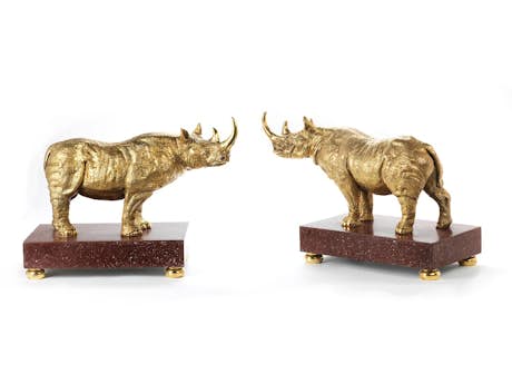Paar Rhinozerosfiguren in vergoldeter Bronze